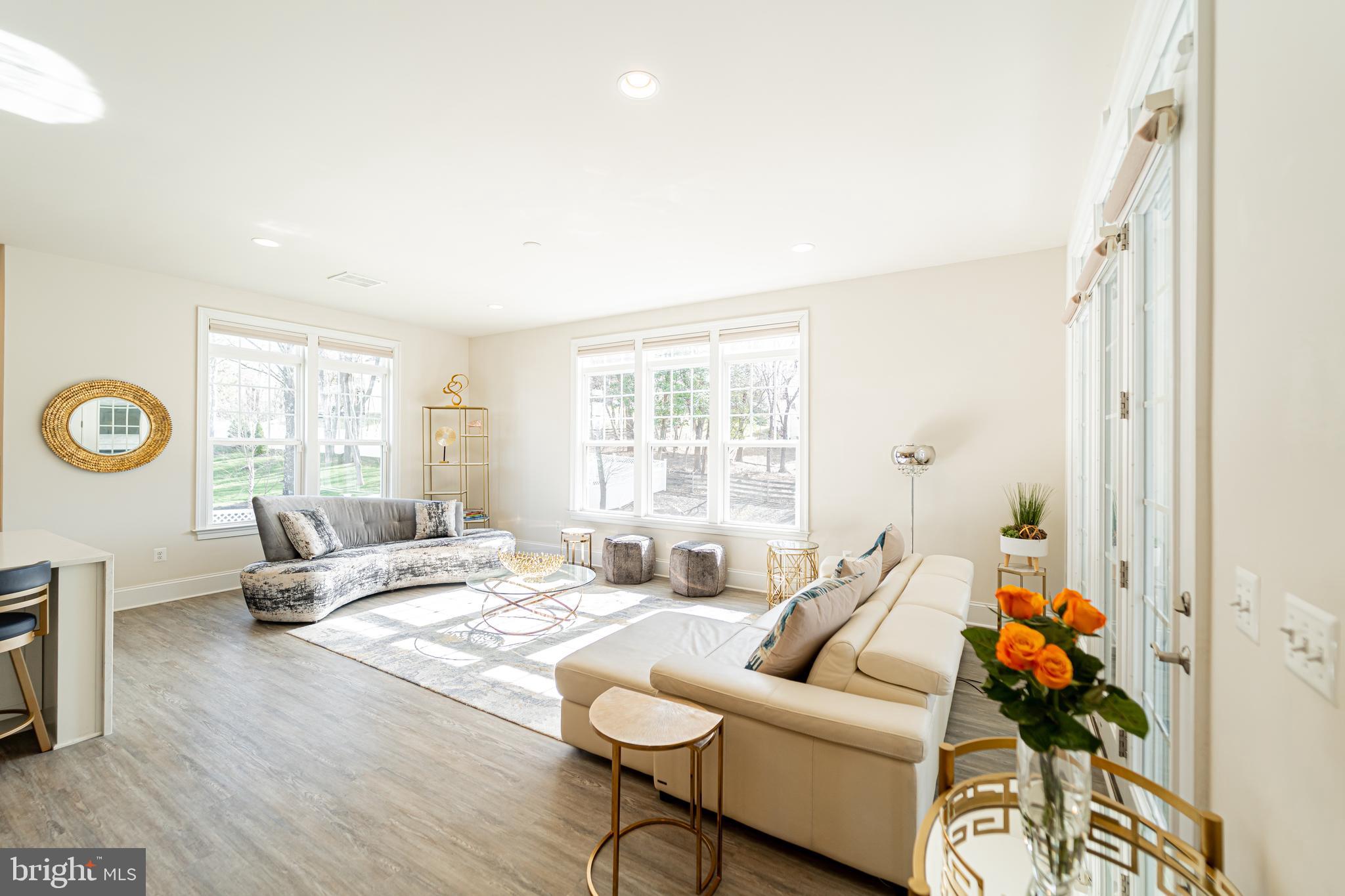 1059 Marmion Drive Herndon, VA 20170 - Photo 29 of 92 a living room with furniture and a large window
