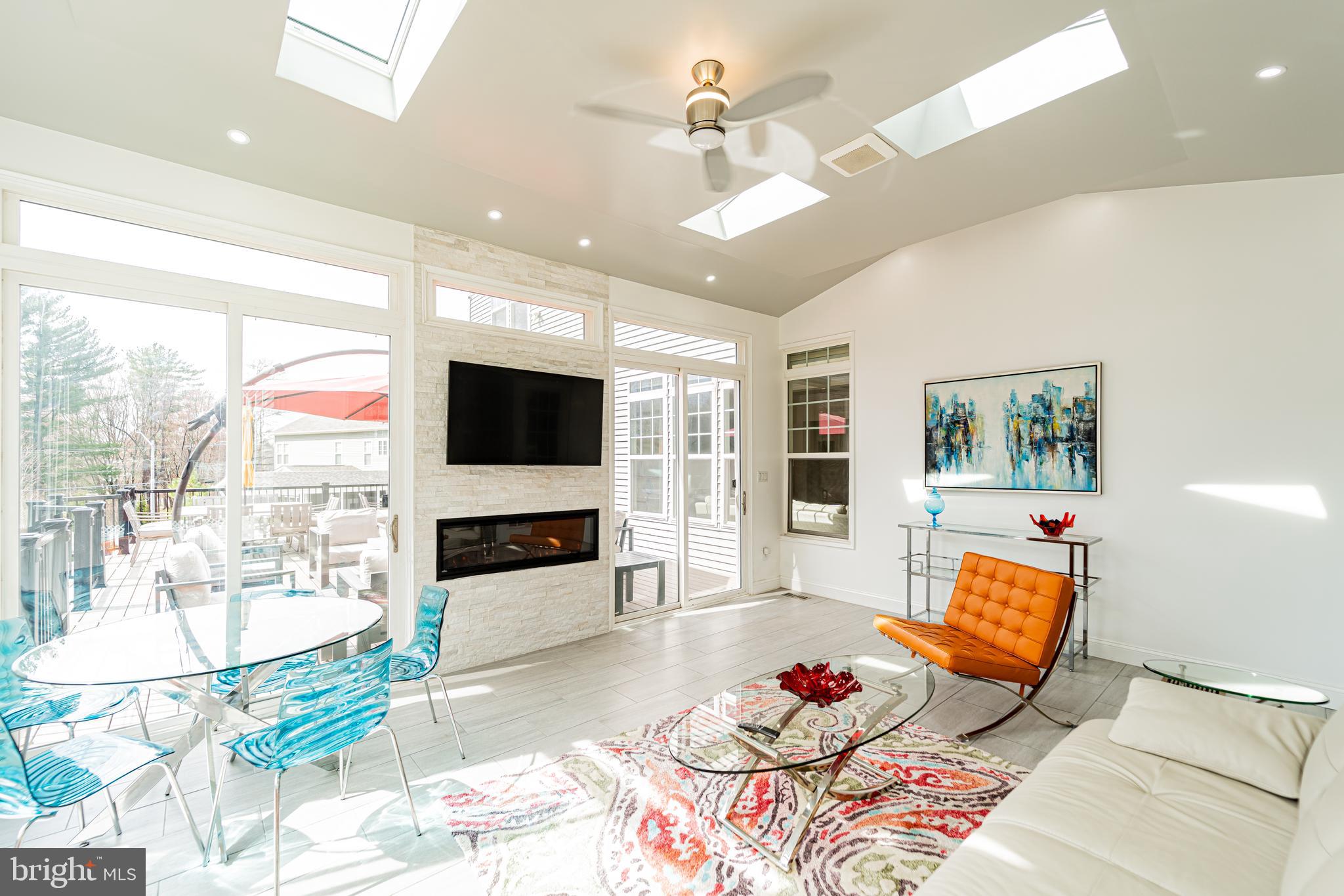 1059 Marmion Drive Herndon, VA 20170 - Photo 35 of 92 a living room with fireplace furniture and a flat screen tv