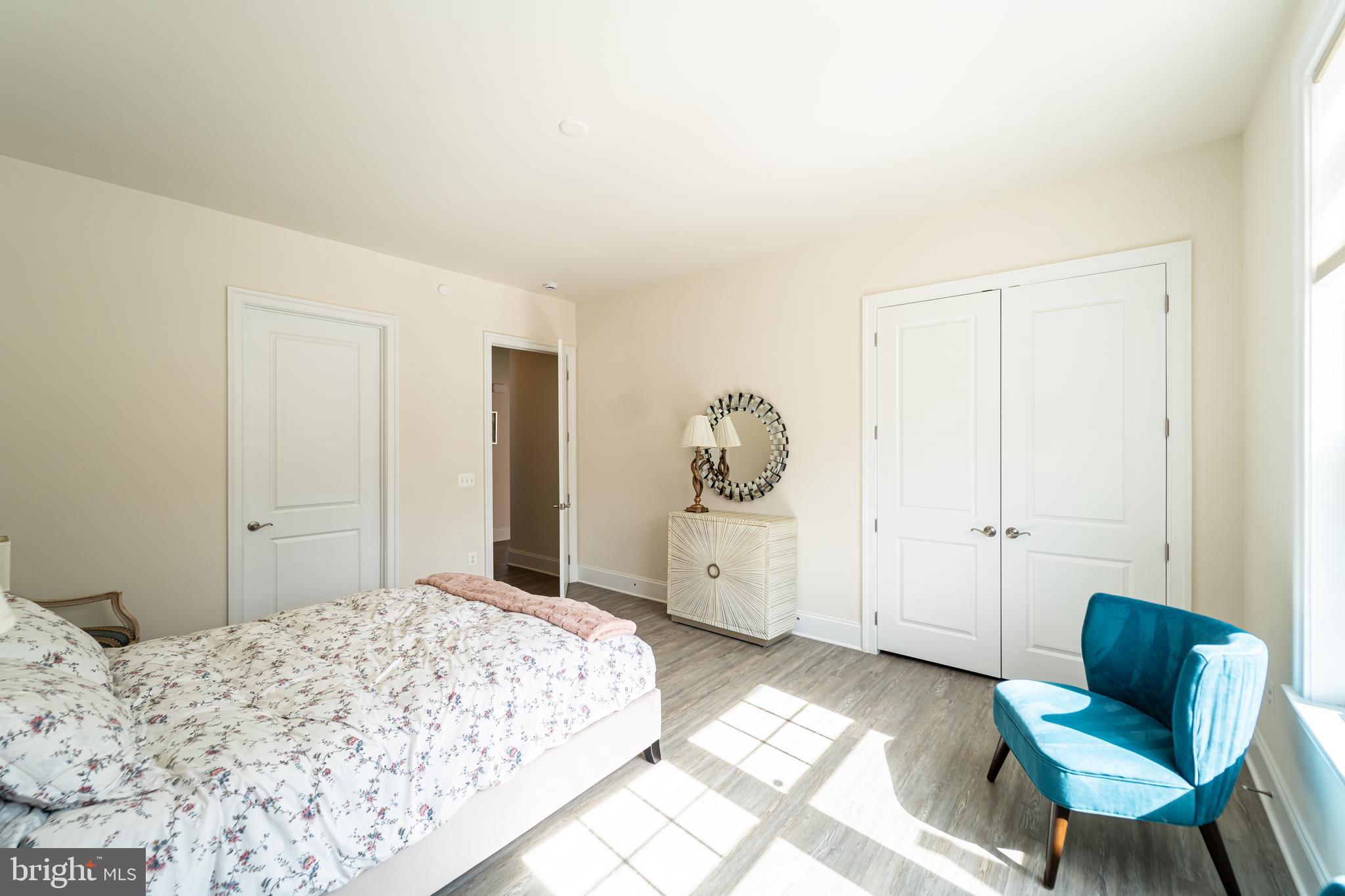 1059 Marmion Drive Herndon, VA 20170 - Photo 40 of 92 a bedroom with a bed and a chair in it