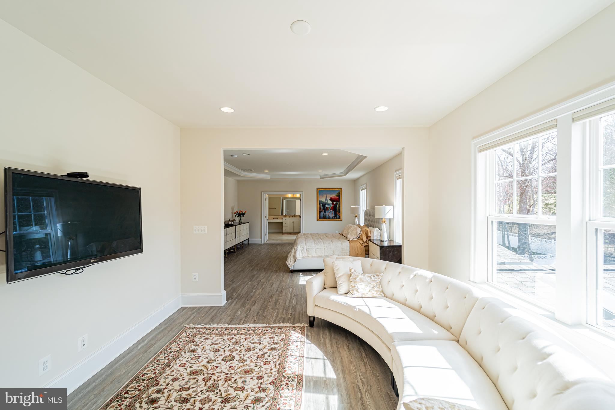 1059 Marmion Drive Herndon, VA 20170 - Photo 47 of 92 a living room with a couch and a flat screen tv