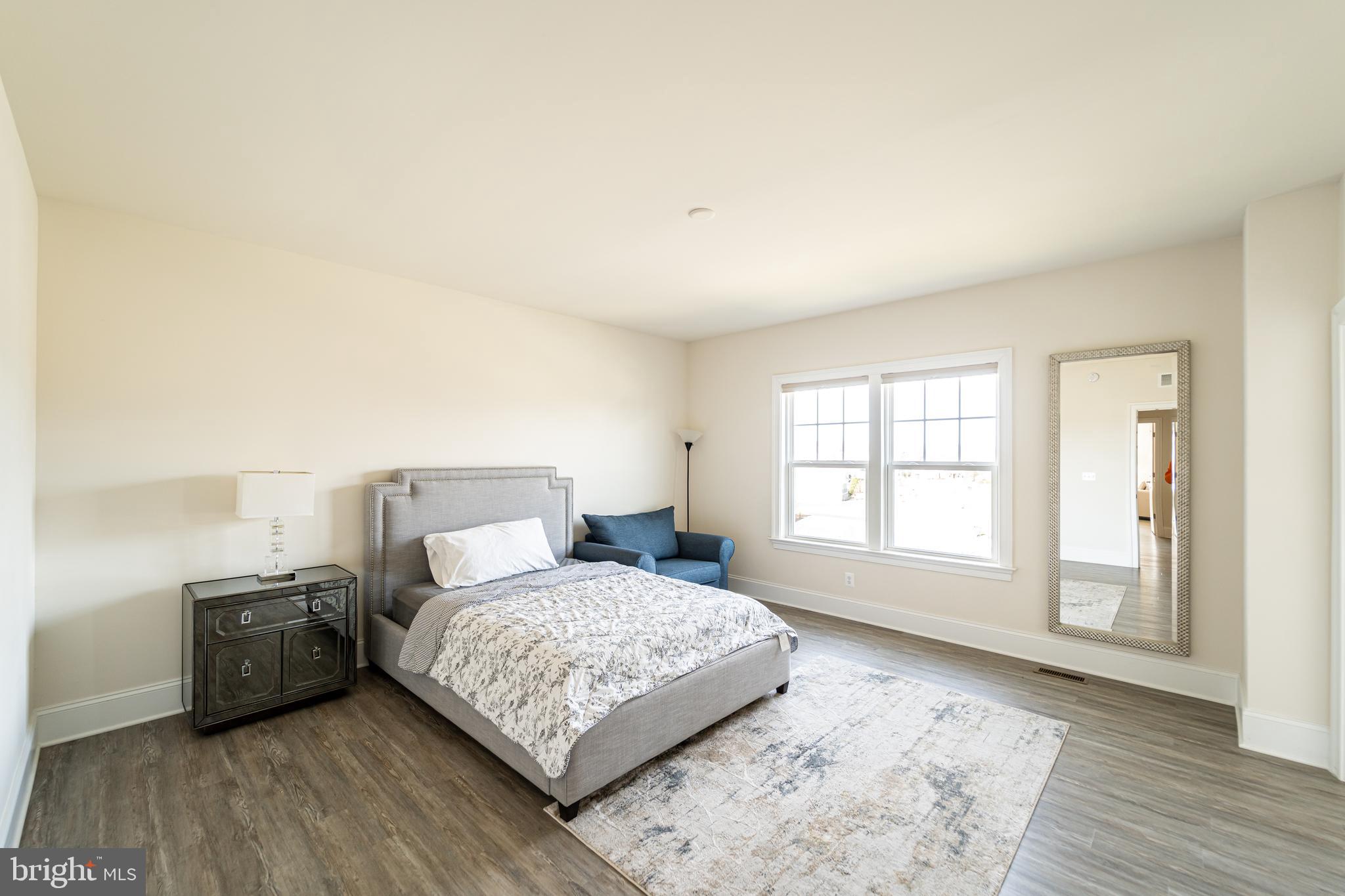 1059 Marmion Drive Herndon, VA 20170 - Photo 59 of 92 a bedroom with a bed and a window