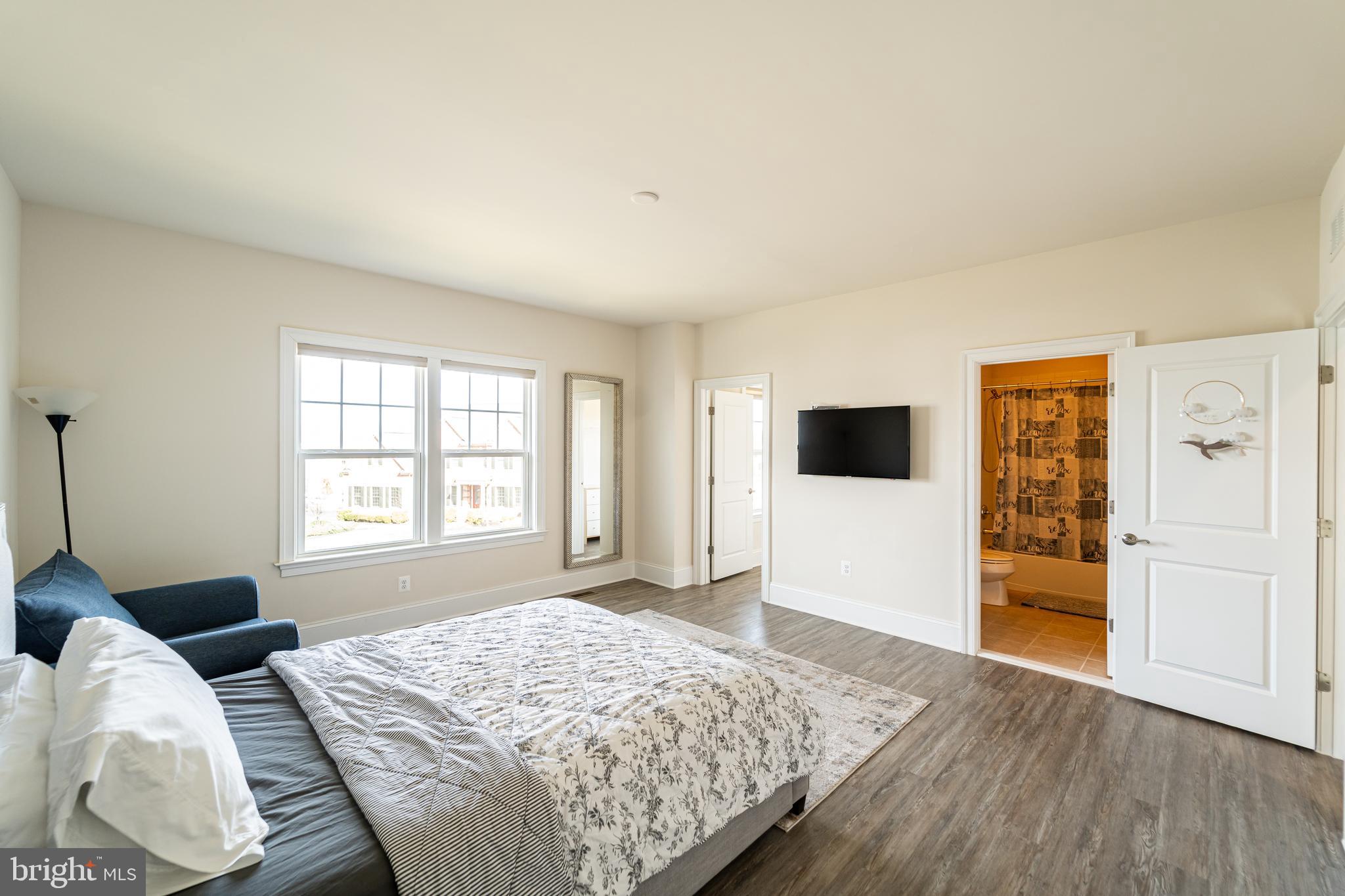 1059 Marmion Drive Herndon, VA 20170 - Photo 60 of 92 a bedroom with a bed and a television