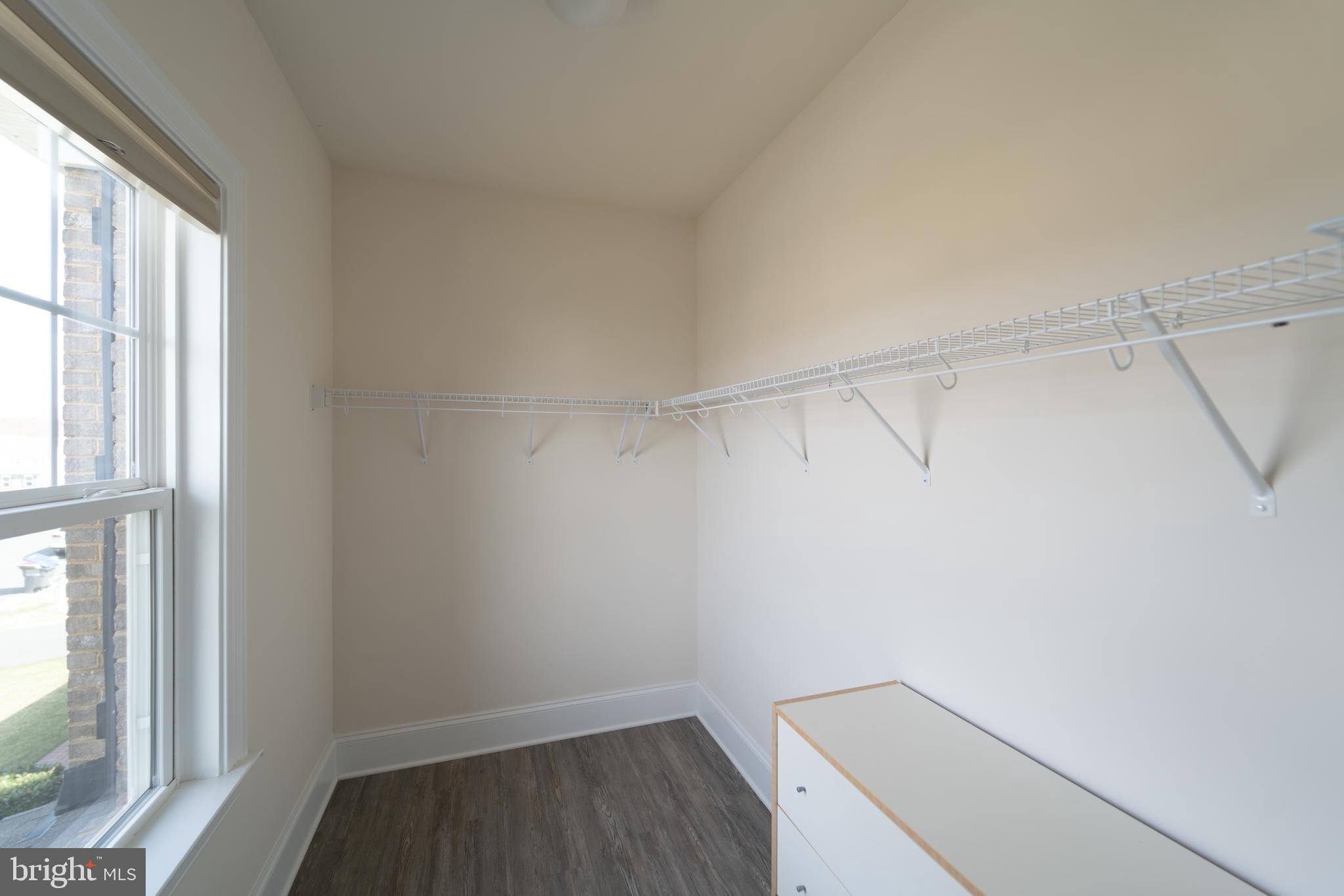 1059 Marmion Drive Herndon, VA 20170 - Photo 62 of 92 a view of a room with racks on the wall