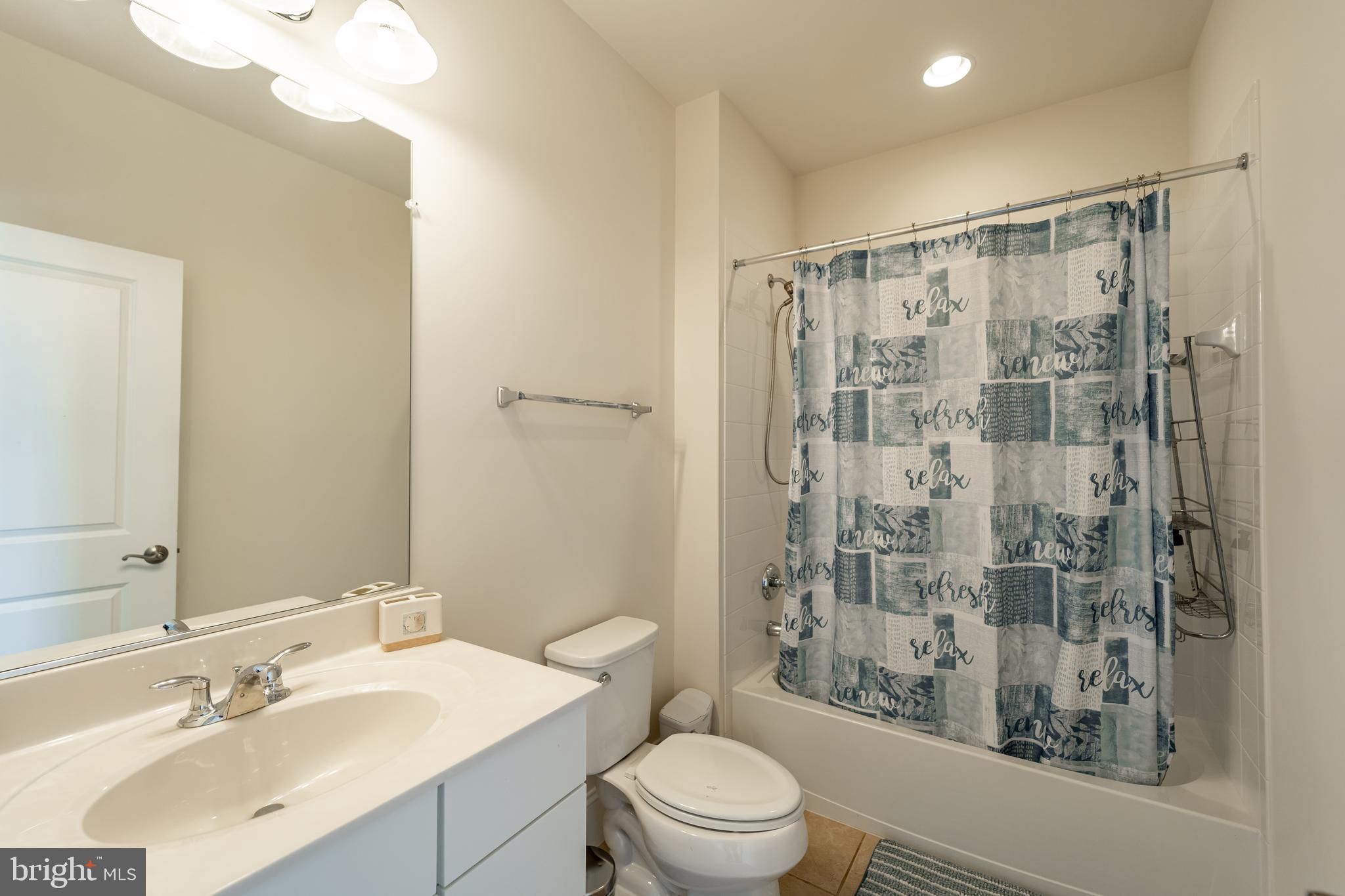 1059 Marmion Drive Herndon, VA 20170 - Photo 63 of 92 a bathroom with a sink a toilet and shower