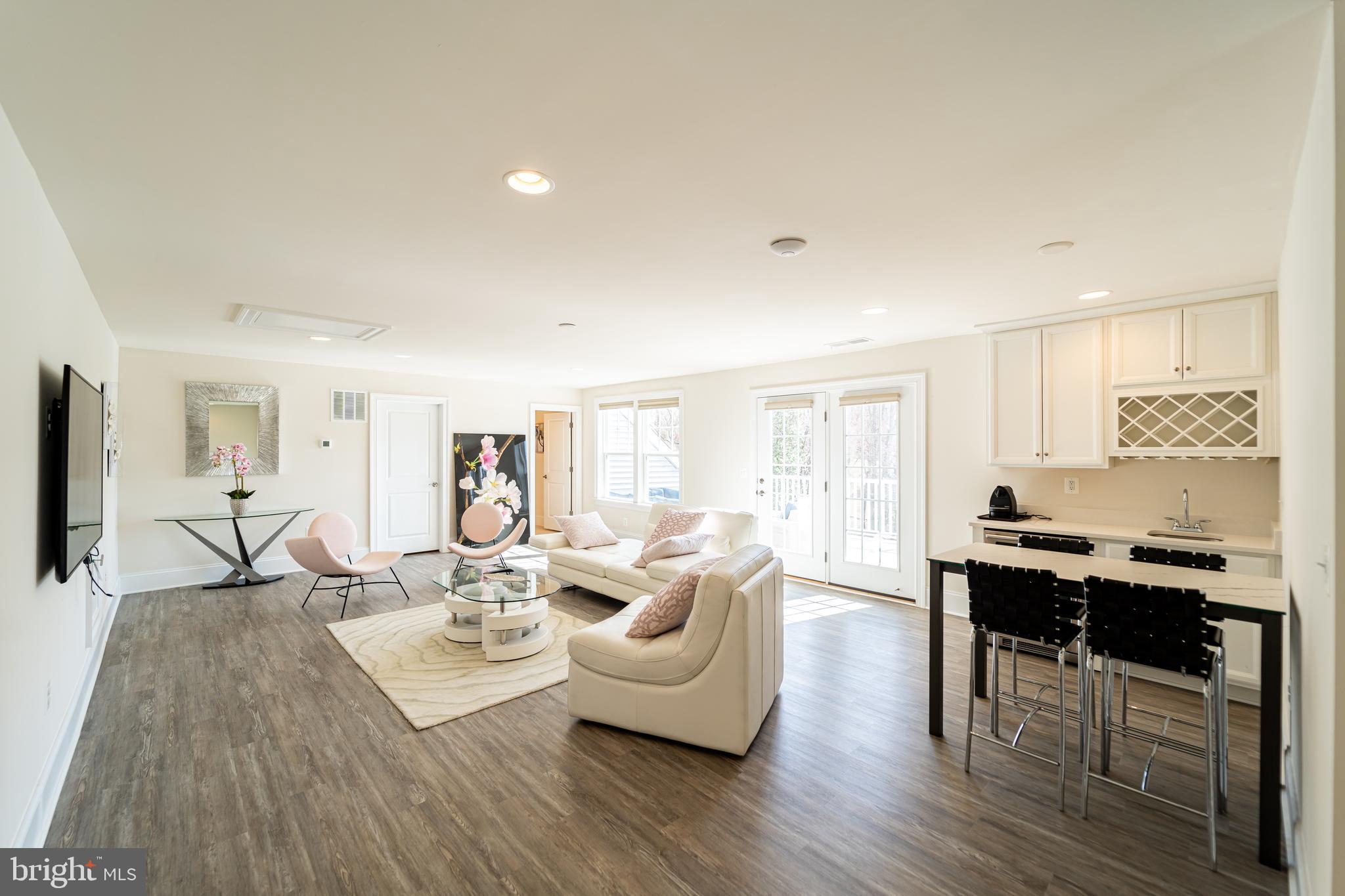 1059 Marmion Drive Herndon, VA 20170 - Photo 69 of 92 a living room with furniture and wooden floor