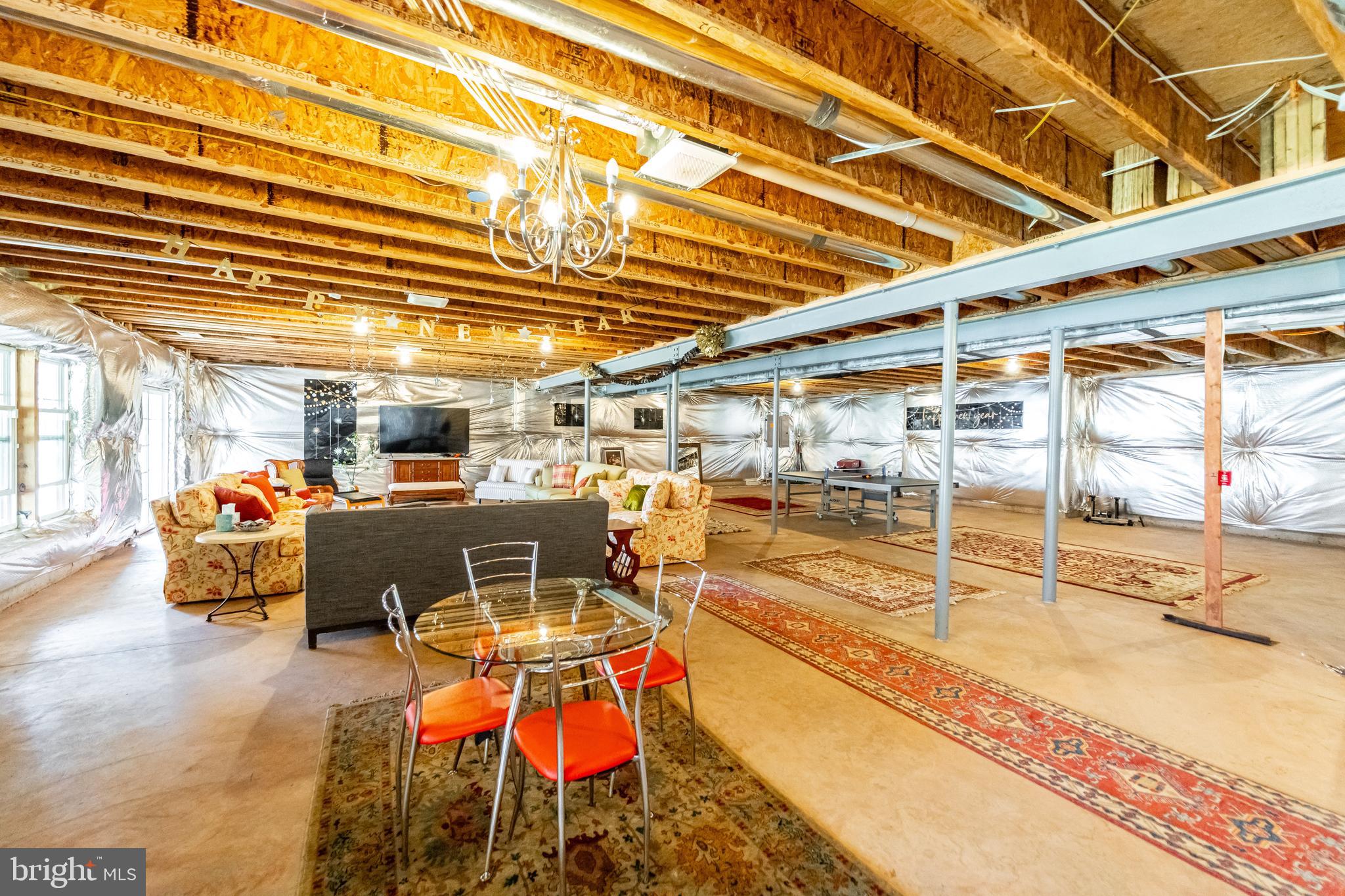 1059 Marmion Drive Herndon, VA 20170 - Photo 79 of 92 a view of a swimming pool with a table and chairs