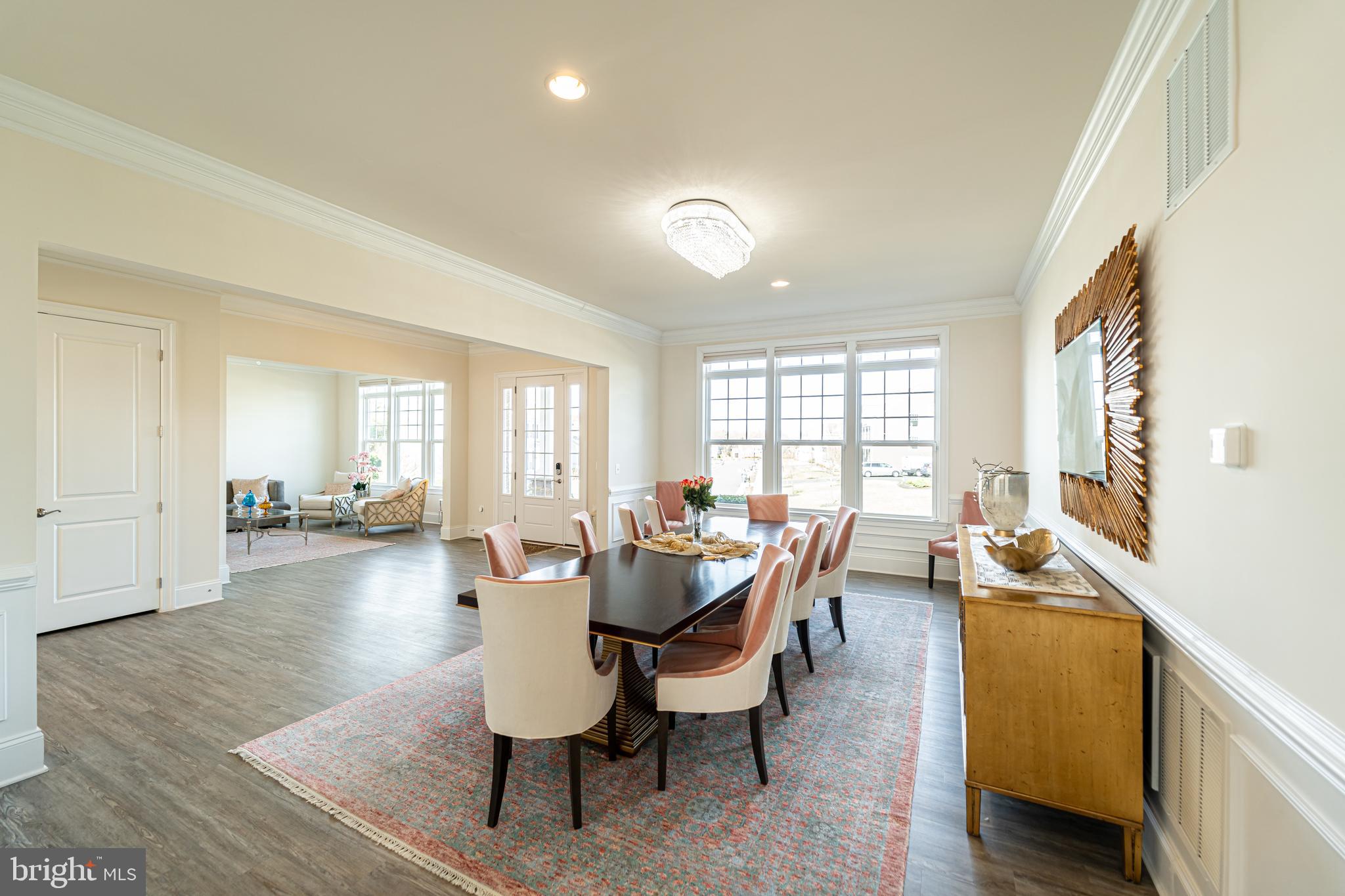 1059 Marmion Drive Herndon, VA 20170 - Photo 8 of 92 a view of a dining room with furniture and wooden floor