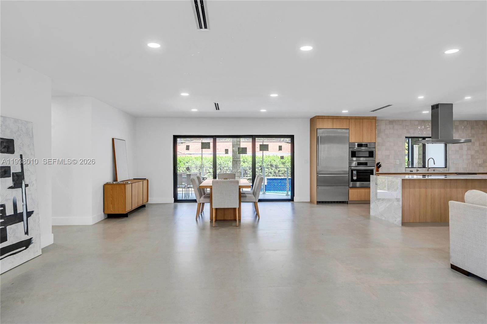 13407 Southwest 59th Avenue Pinecrest, FL 33156 - Photo 11 of 50 a kitchen with furniture and a view of kitchen