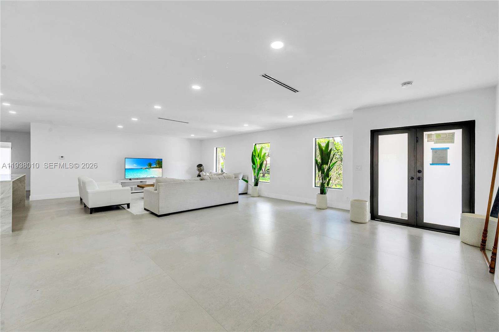 13407 Southwest 59th Avenue Pinecrest, FL 33156 - Photo 6 of 50 a view of a living room and entryway