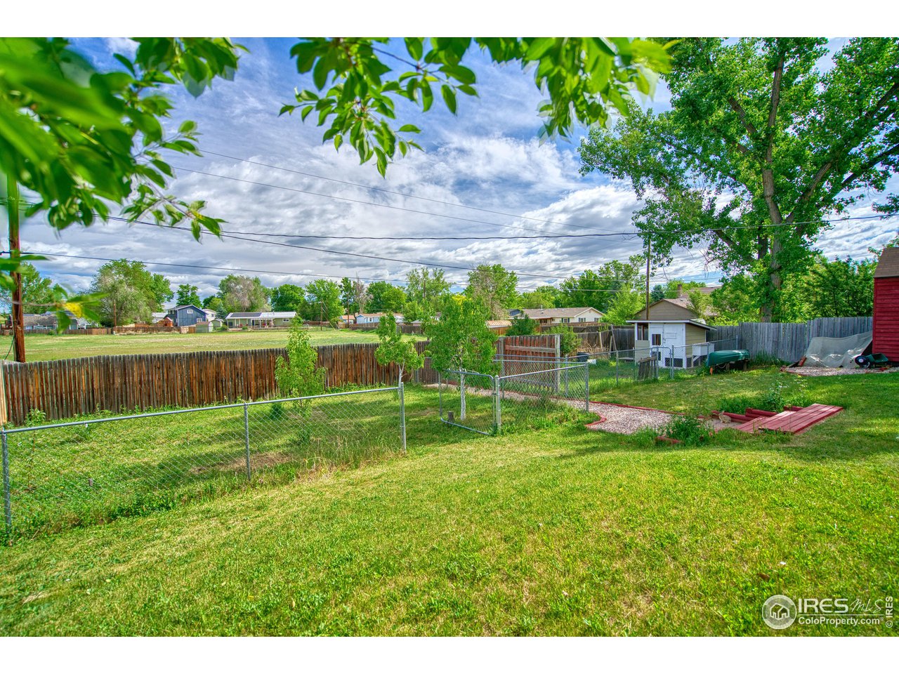 725 Bruce Drive Berthoud, CO 80513 - Photo 17 of 21 a view of a garden with a yard