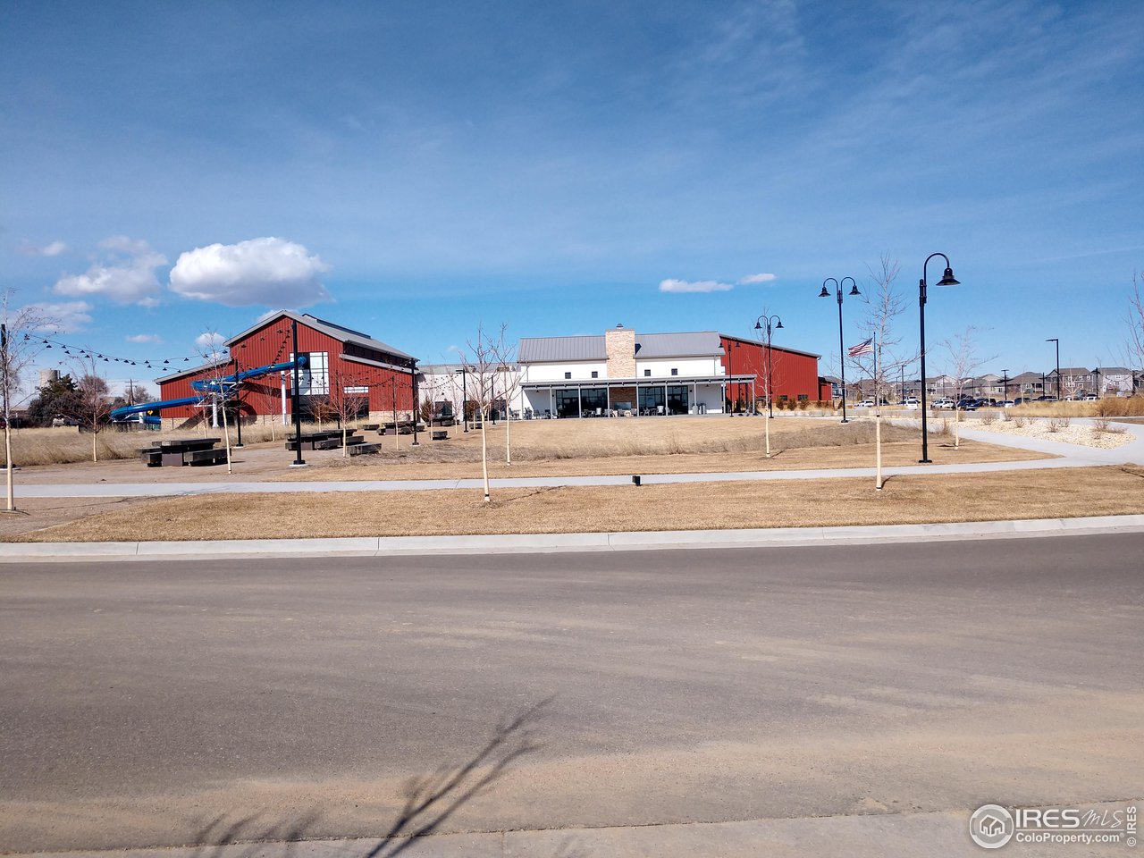 725 Bruce Drive Berthoud, CO 80513 - Photo 2 of 21 a backyard of a house with a table and chairs