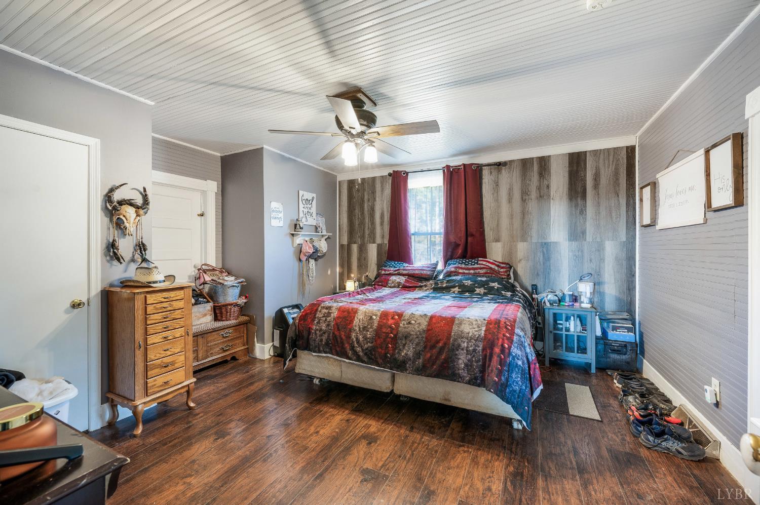 342 Toll Gate Road Concord, VA 24538 - Photo 12 of 48 a bed room with a bed and a ceiling fan