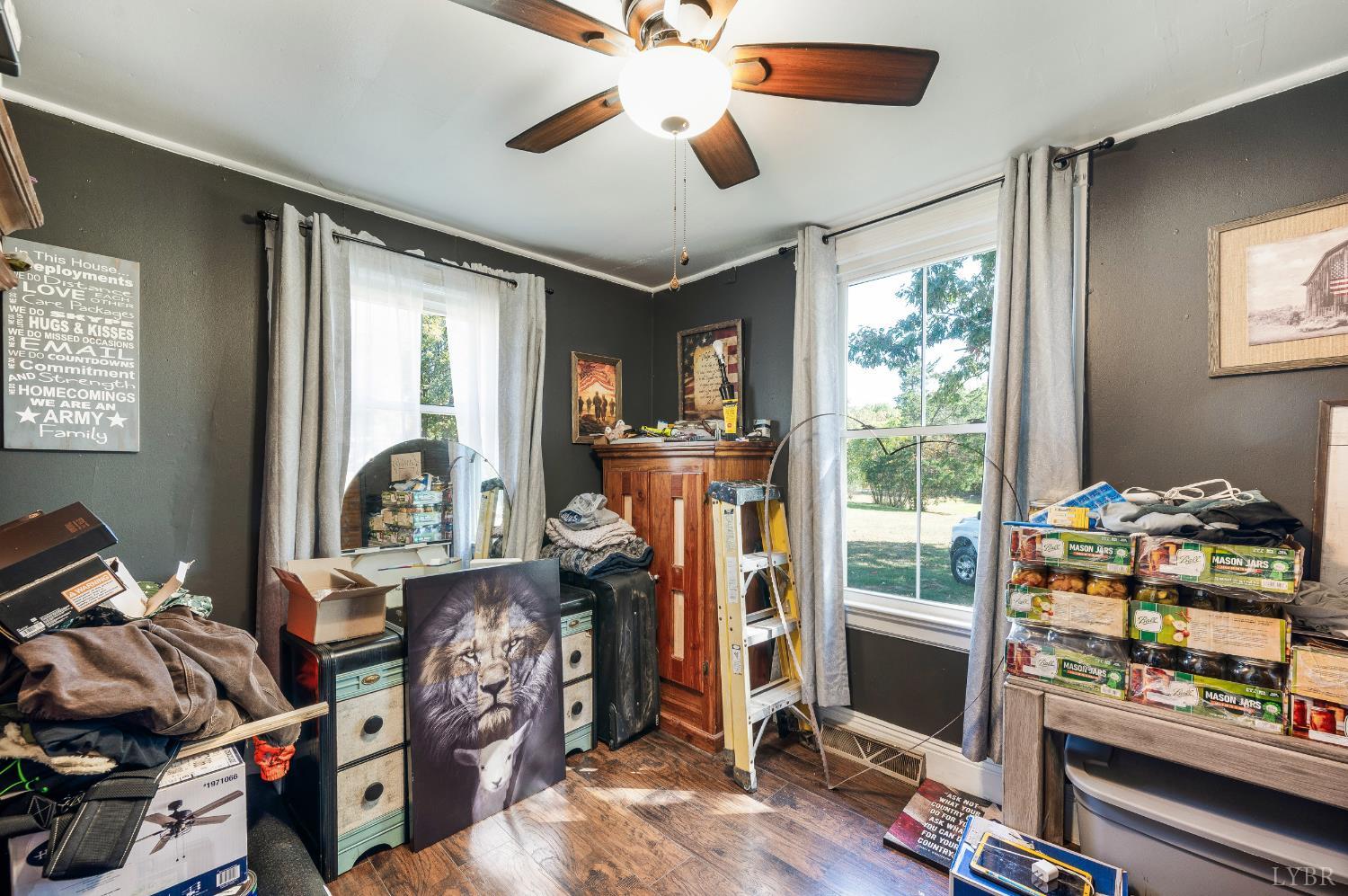 342 Toll Gate Road Concord, VA 24538 - Photo 20 of 48 a view of a livingroom with furniture and a flat screen tv