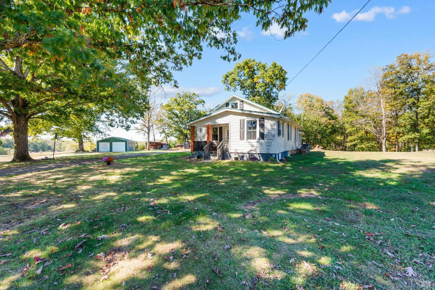 342 Toll Gate Road Concord, VA 24538 - Photo 2 of 48 a front view of a house with a yard