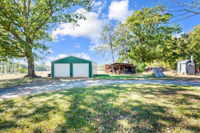 a view of a house with a big yard