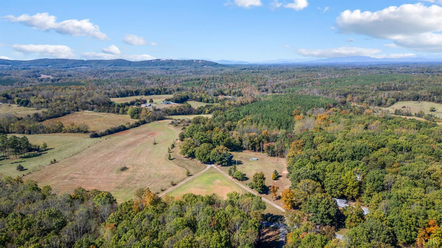 342 Toll Gate Road Concord, VA 24538 - Photo 26 of 48 a view of a dry yard with mountains