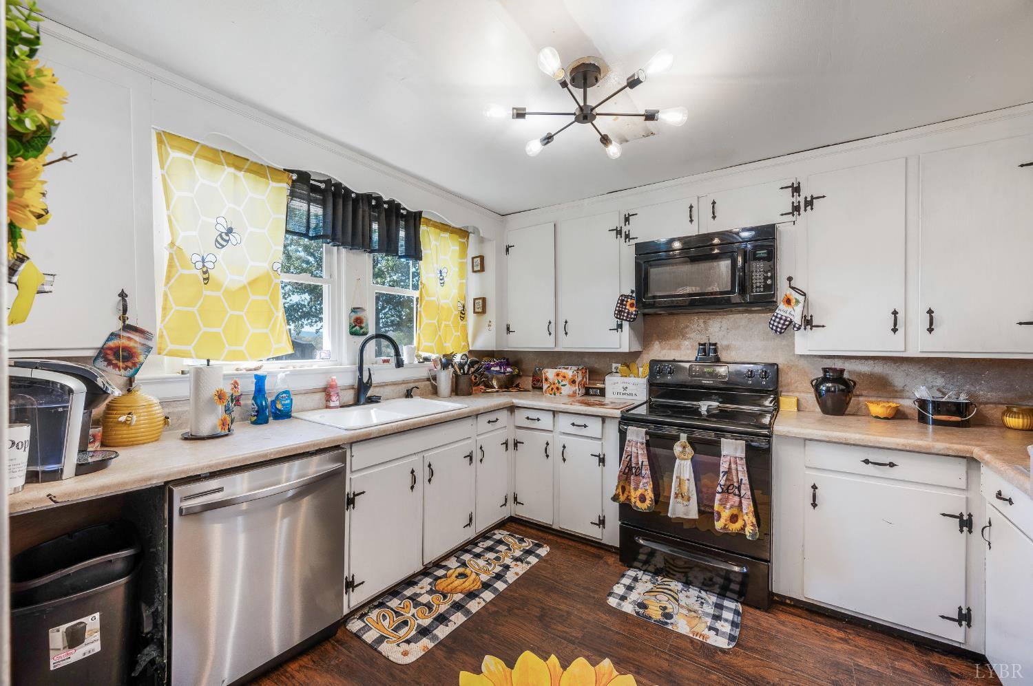 342 Toll Gate Road Concord, VA 24538 - Photo 10 of 48 a kitchen with a sink stove and microwave