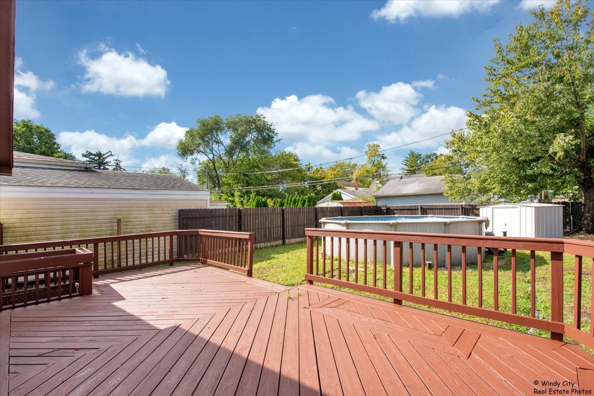 14914 Avers Avenue Midlothian, IL 60445 - Photo 20 of 22 a view of a balcony with wooden floor