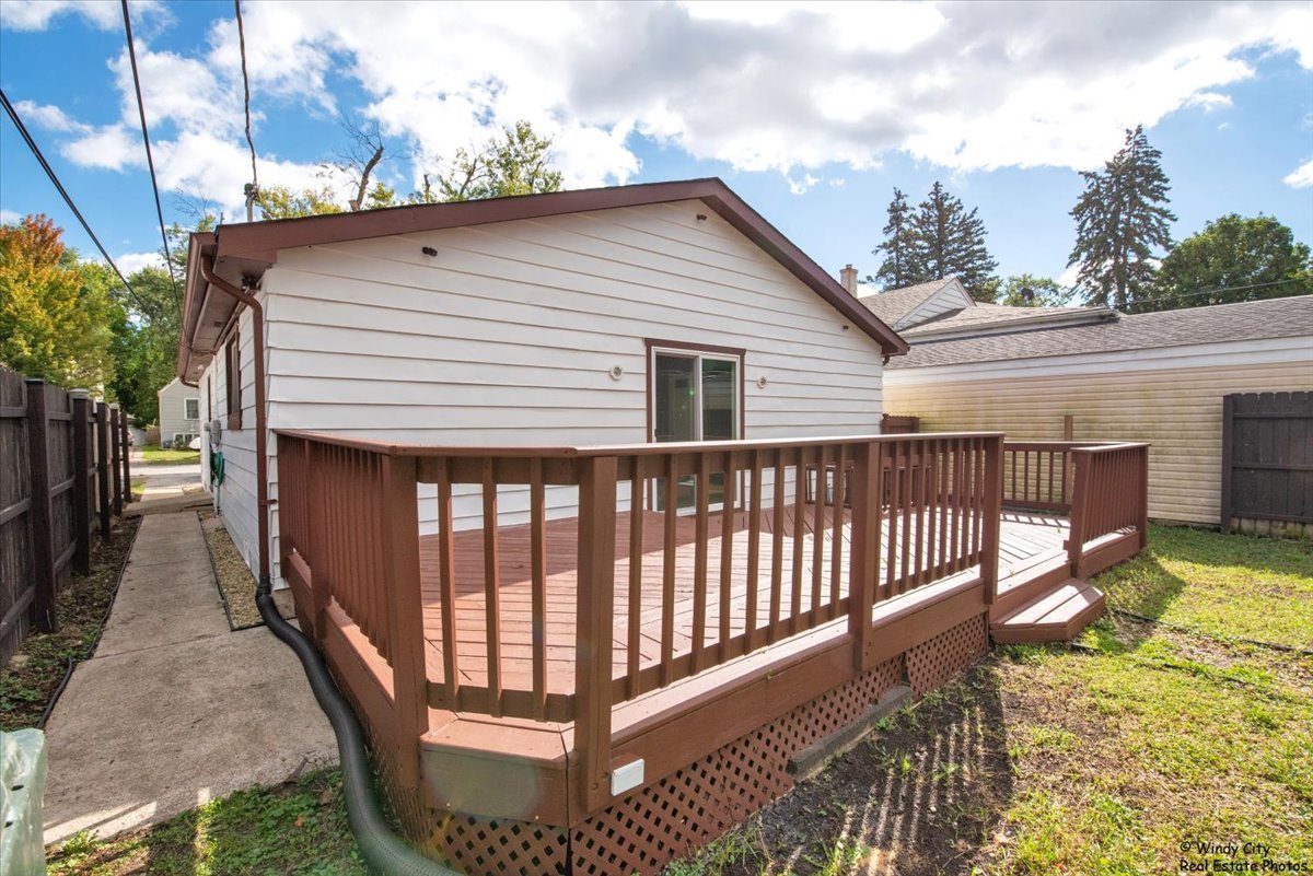 14914 Avers Avenue Midlothian, IL 60445 - Photo 21 of 22 a view of a house with backyard and sitting area