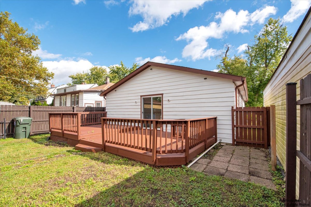 14914 Avers Avenue Midlothian, IL 60445 - Photo 22 of 22 a view of a house with a yard and deck