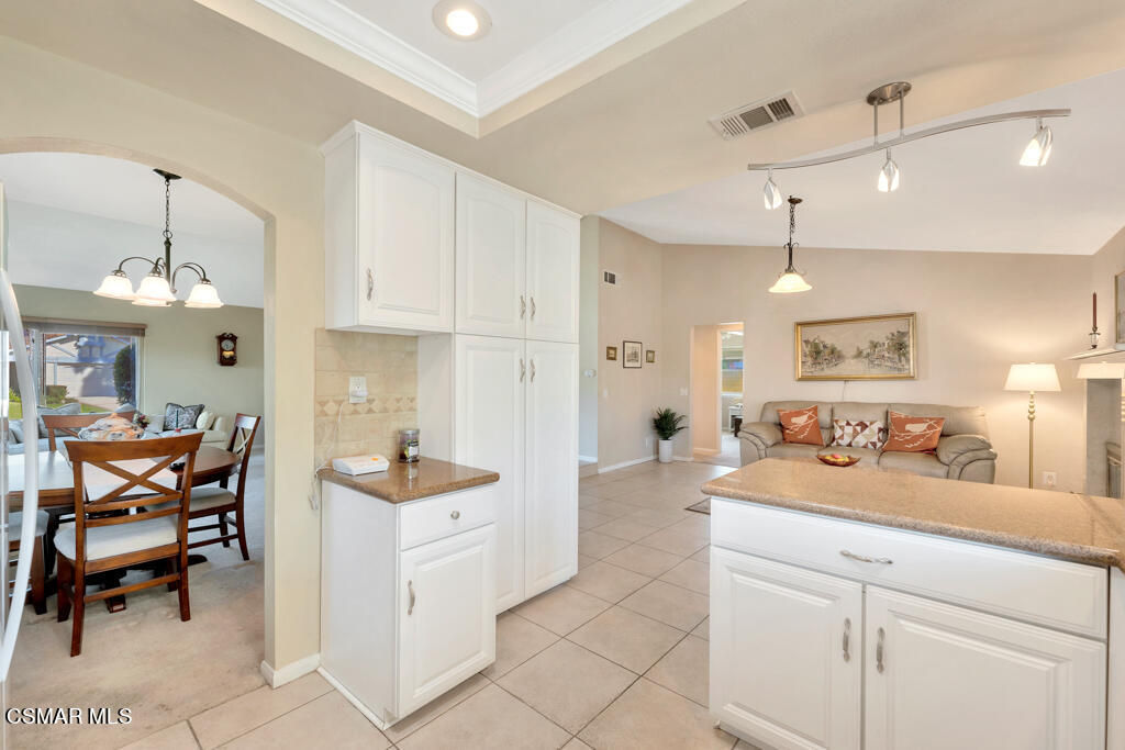 4331 Mill Valley Road Moorpark, CA 93021 - Photo 13 of 40 a kitchen with a sink and chairs
