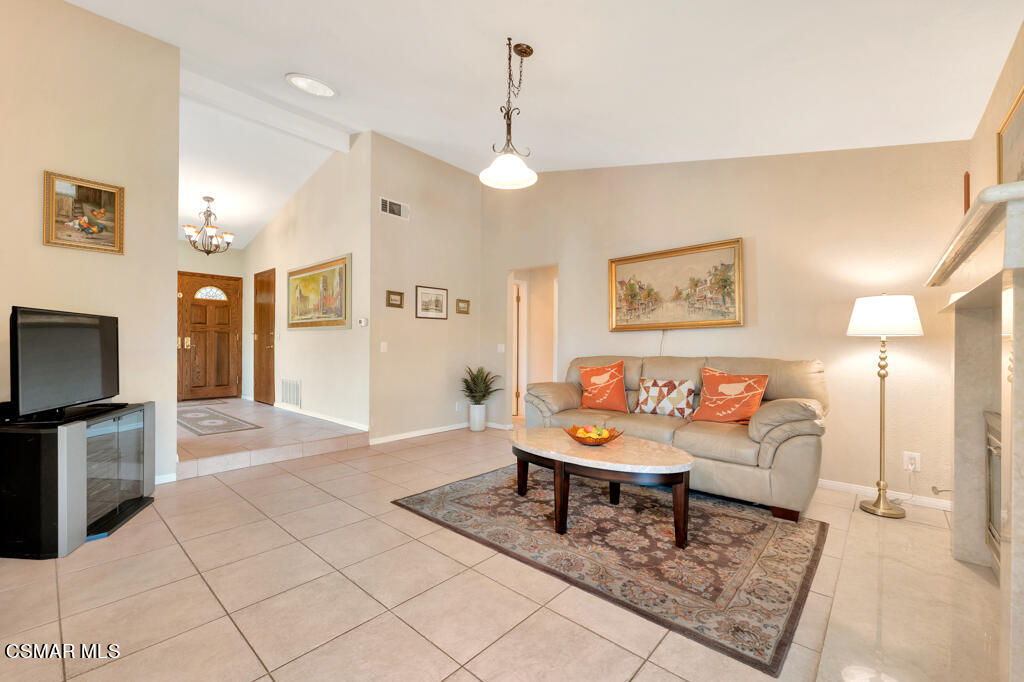 4331 Mill Valley Road Moorpark, CA 93021 - Photo 16 of 40 a living room with furniture and a flat screen tv