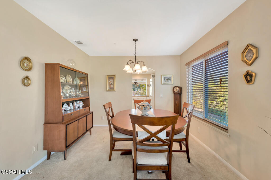 4331 Mill Valley Road Moorpark, CA 93021 - Photo 17 of 40 a dining room with furniture and window