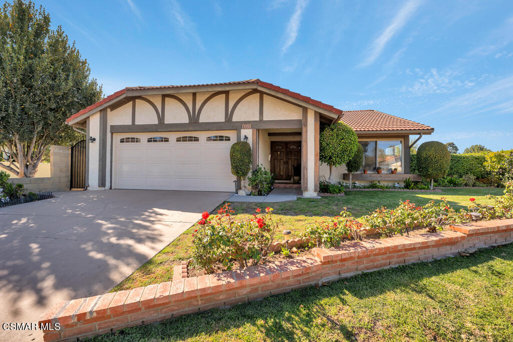 4331 Mill Valley Road Moorpark, CA 93021 - Photo 3 of 40 a view of house with swimming pool and a yard