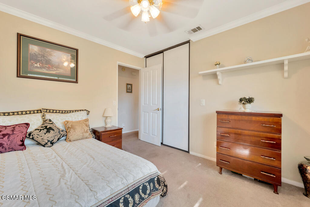 4331 Mill Valley Road Moorpark, CA 93021 - Photo 27 of 40 a bedroom with a bed and a cabinets