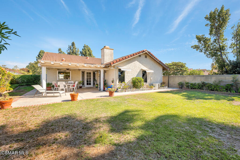 4331 Mill Valley Road Moorpark, CA 93021 - Photo 28 of 40 a view of a house with swimming pool and a yard