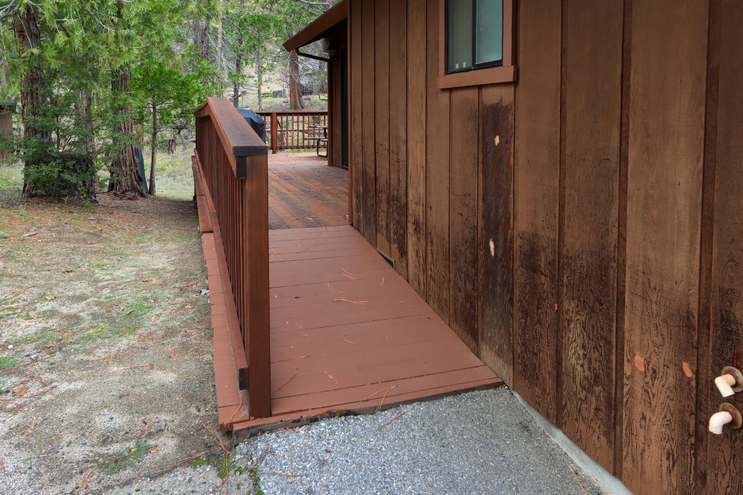 8041 Chilnualna Falls Road Wawona, CA 95389 - Photo 35 of 46 a view of a wooden door and deck