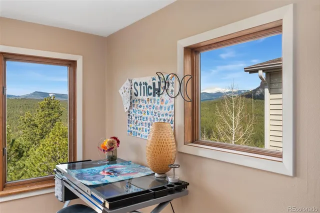 a view of a terrace with furniture