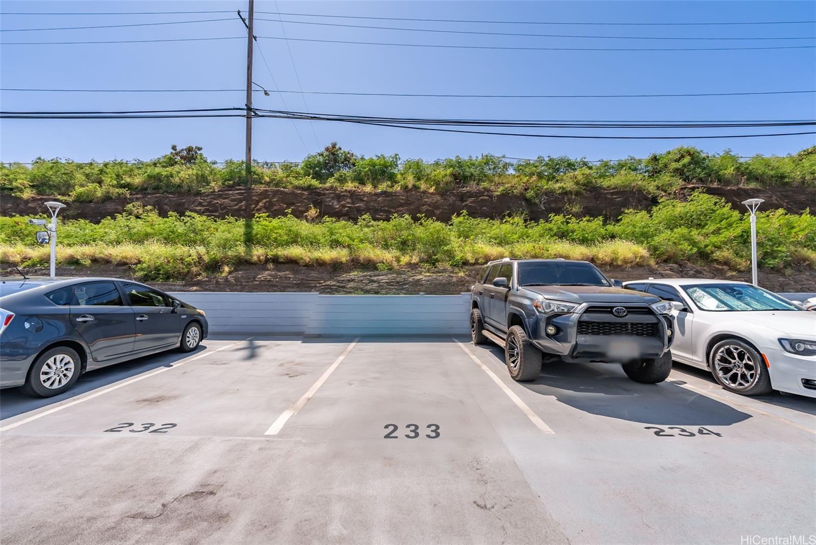 3045 Ala Napuaa Place, Unit 1305 Honolulu, HI 96818 - Photo 15 of 18 a view of a car parked in garage