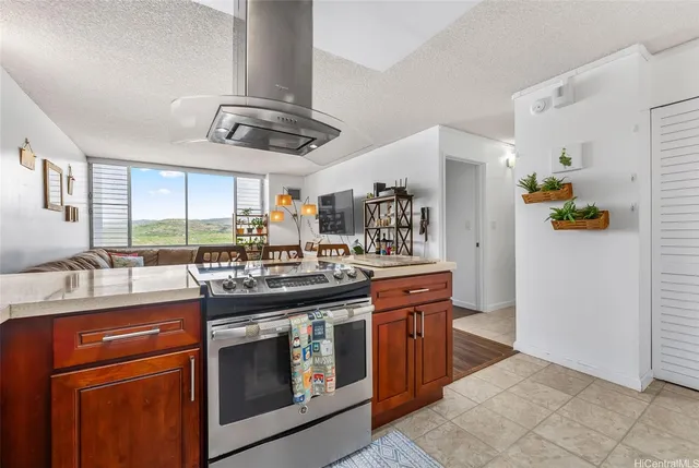 a kitchen with stainless steel appliances granite countertop a sink and cabinets