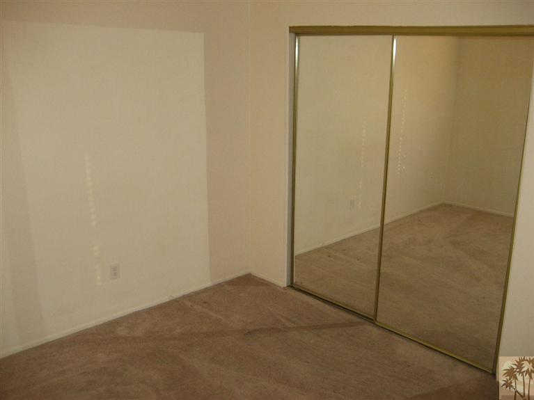 72710 Eagle Road, Unit 4 Palm Desert, CA 92260 - Photo 7 of 9 a view of an empty room
