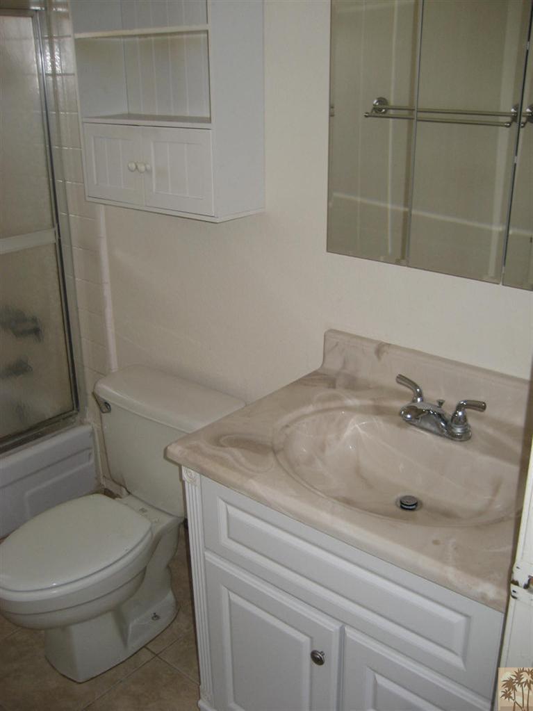 72710 Eagle Road, Unit 4 Palm Desert, CA 92260 - Photo 8 of 9 a bathroom with a sink and toilet
