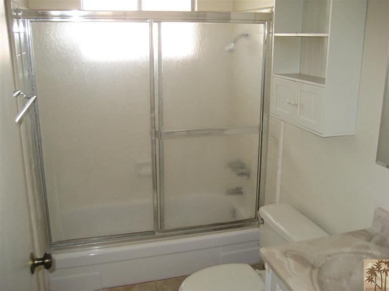 72710 Eagle Road, Unit 4 Palm Desert, CA 92260 - Photo 9 of 9 a bathroom with a shower and toilet