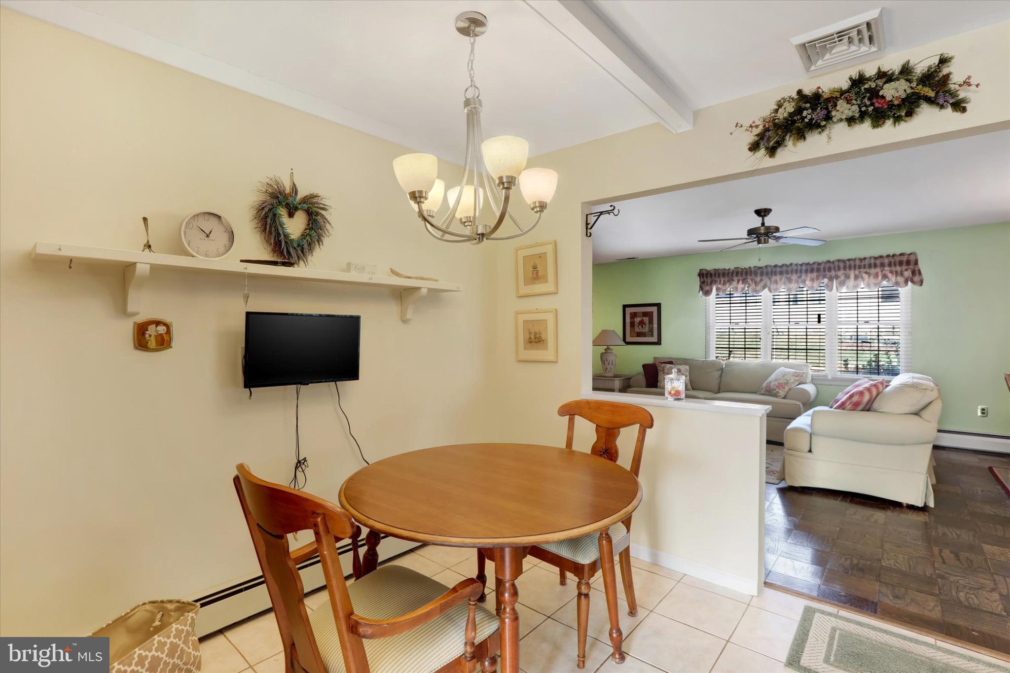 15 Cable Road Levittown, PA 19057 - Photo 7 of 16 Charming dining nook with inviting ambiance.