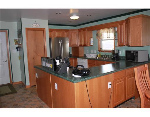 15414 West Lebanon Road Avonmore, PA 15618 - Photo 8 of 13 Kitchen. Oak cabinets w/2 pantries. Appliances included. Recessed lighting, Small desk area, ceiling fan & light. Breakfast area for eating that lead to large deck.