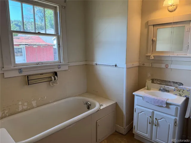 a bathroom with a mirror