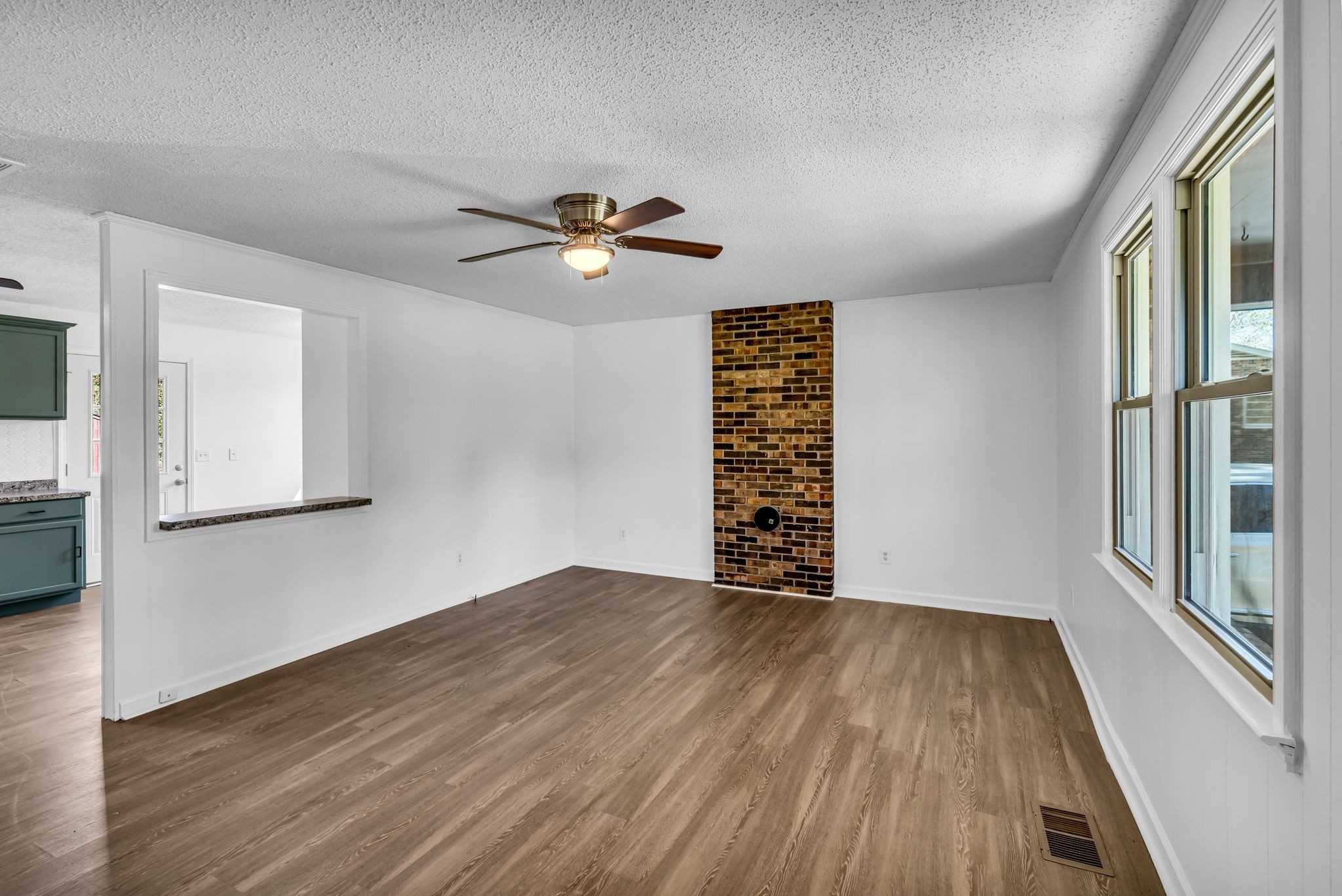 955 Hamilton Chambers Road Lebanon, TN 37087 - Photo 5 of 30 wooden floor in an empty room with a window