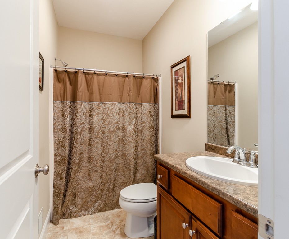 2 Thorn Hill Road, Unit 2 Hooksett, NH 03106 - Photo 7 of 27 a bathroom with a granite countertop sink toilet and shower