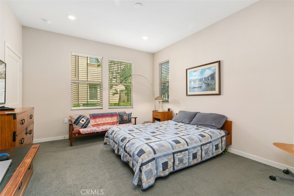 229 Carlow Irvine, CA 92618 - Photo 11 of 32 a bedroom with a bed and a window