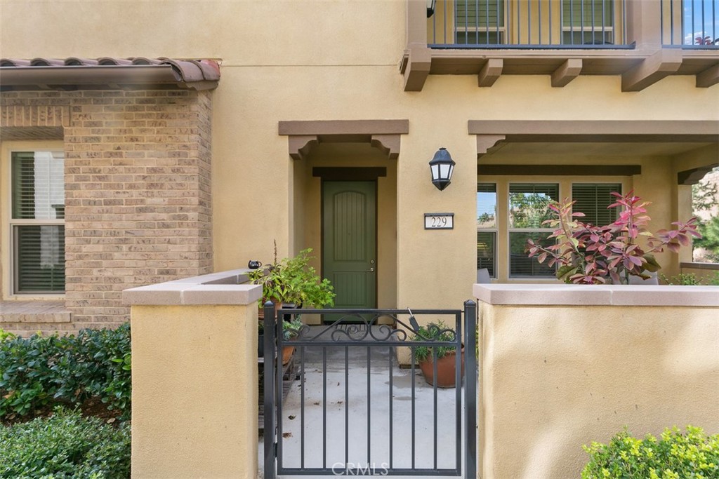 229 Carlow Irvine, CA 92618 - Photo 18 of 32 a front view of a house with an outdoor space