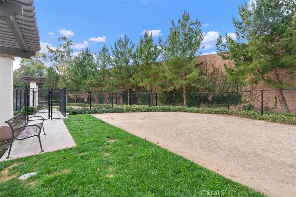 229 Carlow Irvine, CA 92618 - Photo 30 of 32 a view of a backyard with a garden