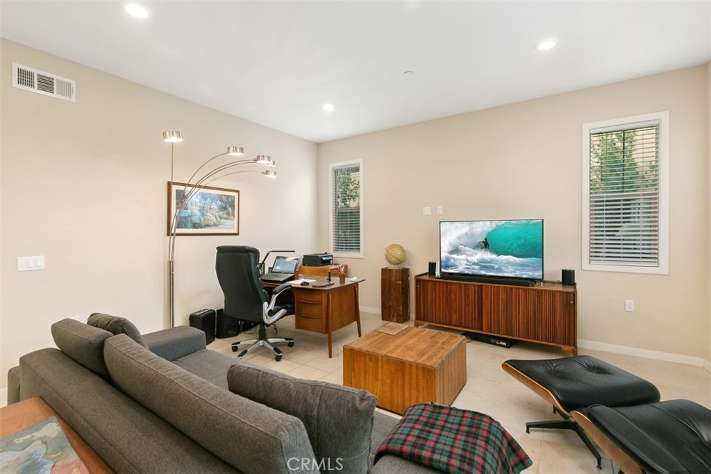 229 Carlow Irvine, CA 92618 - Photo 7 of 32 a living room with furniture and a window
