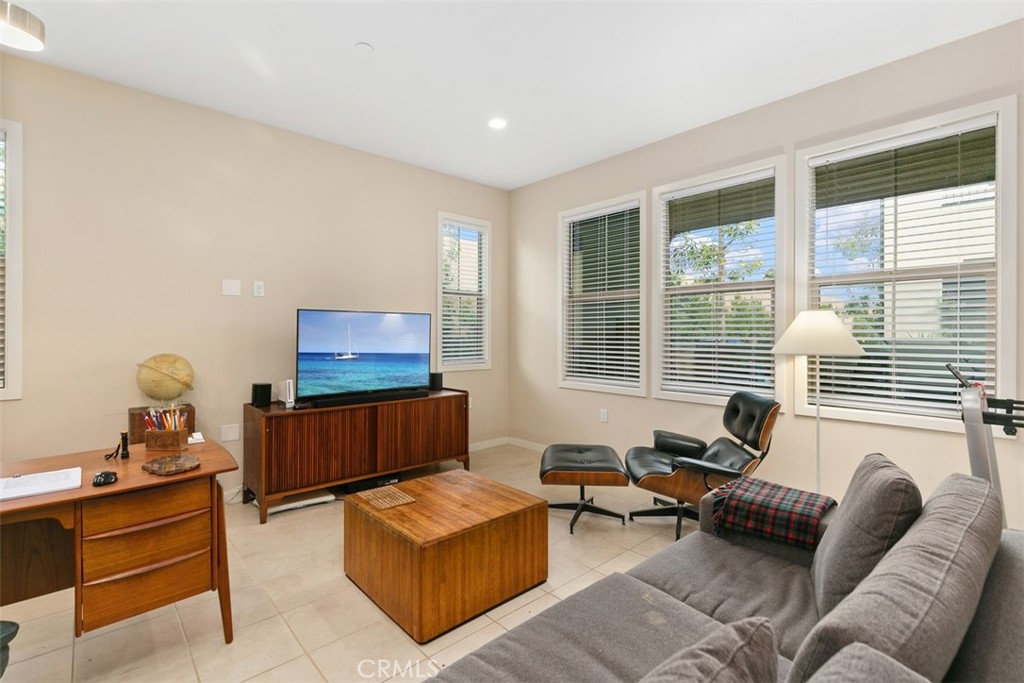 229 Carlow Irvine, CA 92618 - Photo 9 of 32 a living room with furniture and a window