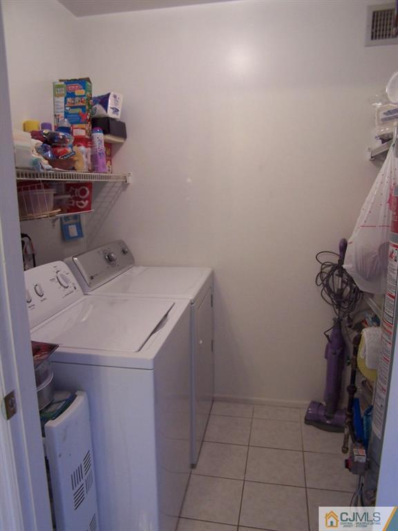 9 Westley Road Old Bridge, NJ 08857 - Photo 7 of 16 a utility room with dryer and washer