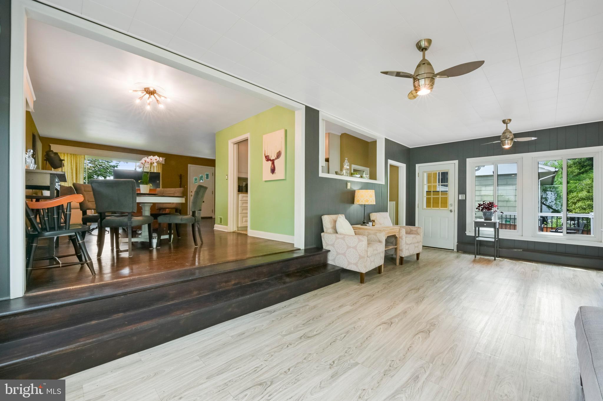 135 Sumner Road Annapolis, MD 21401 - Photo 7 of 30 Two steps down to the enormous sunroom