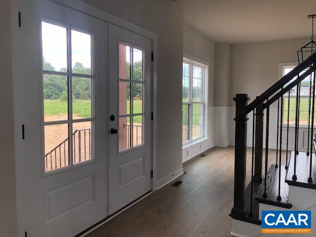 1847 Hollands Road Palmyra, VA 22963 - Photo 5 of 23 a view of an entryway with wooden floor and door
